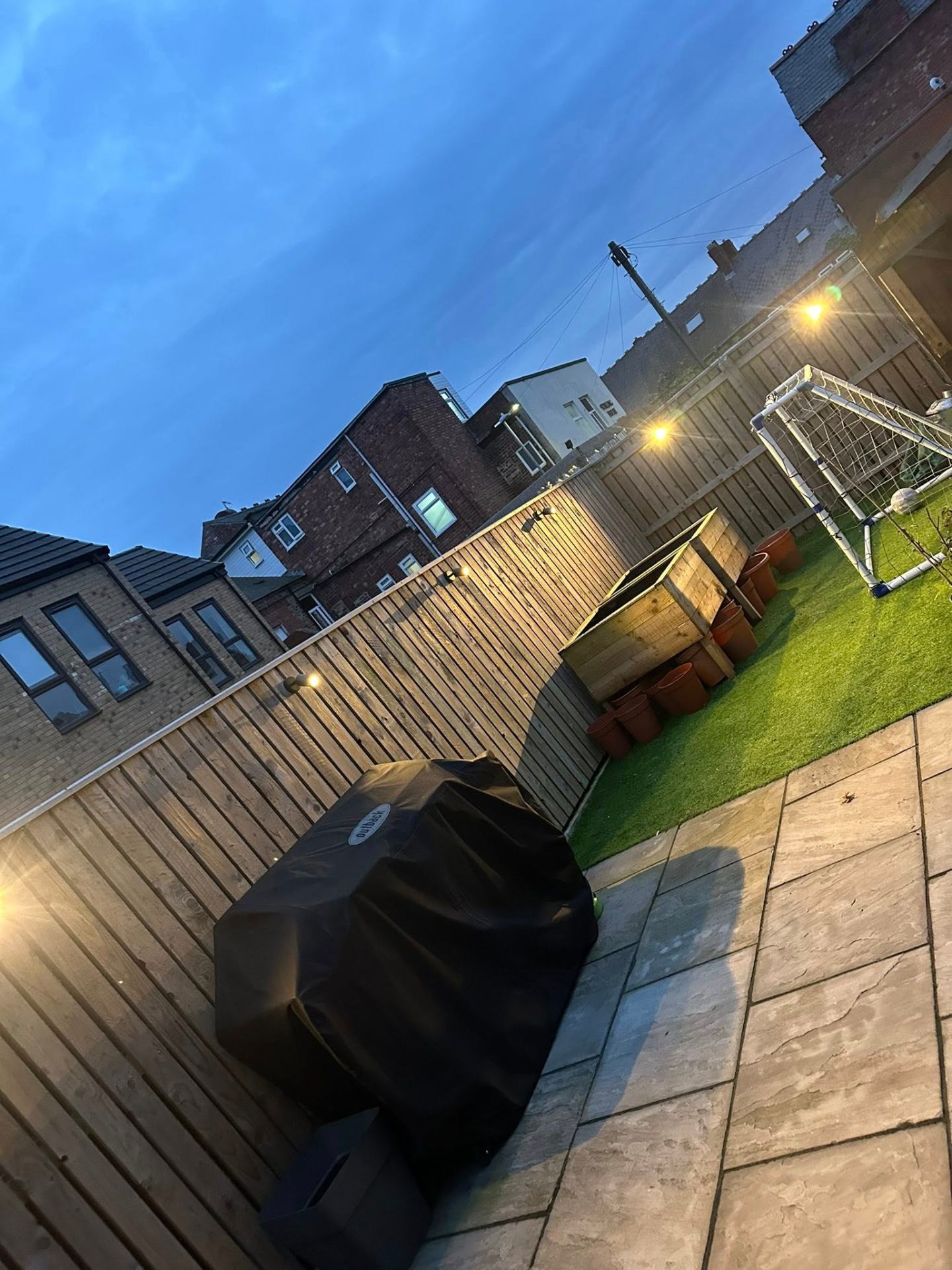 Garden with outdoor wall lights