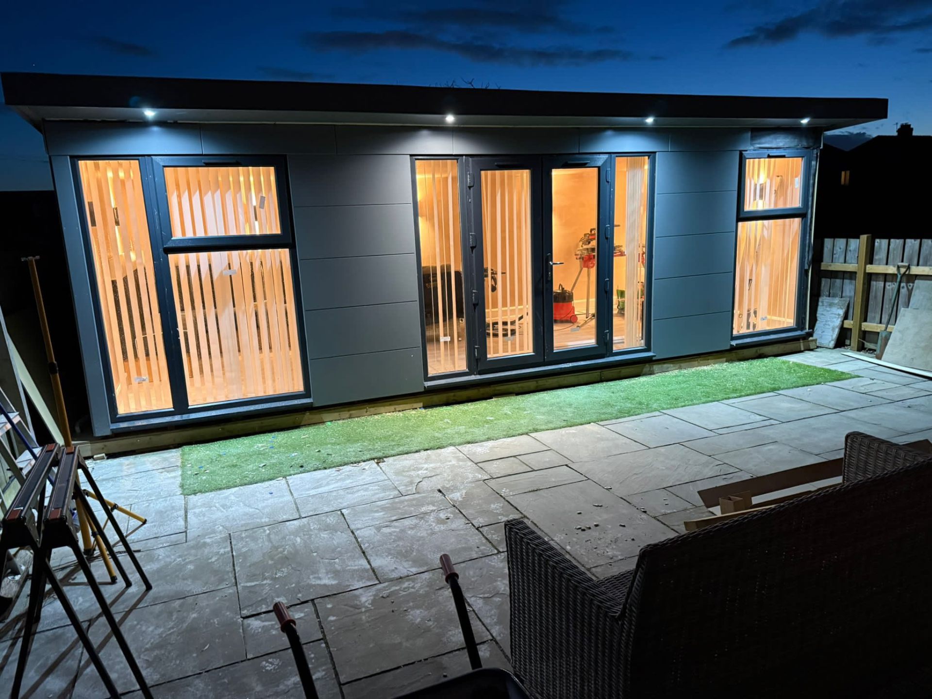 Summer house lit at night